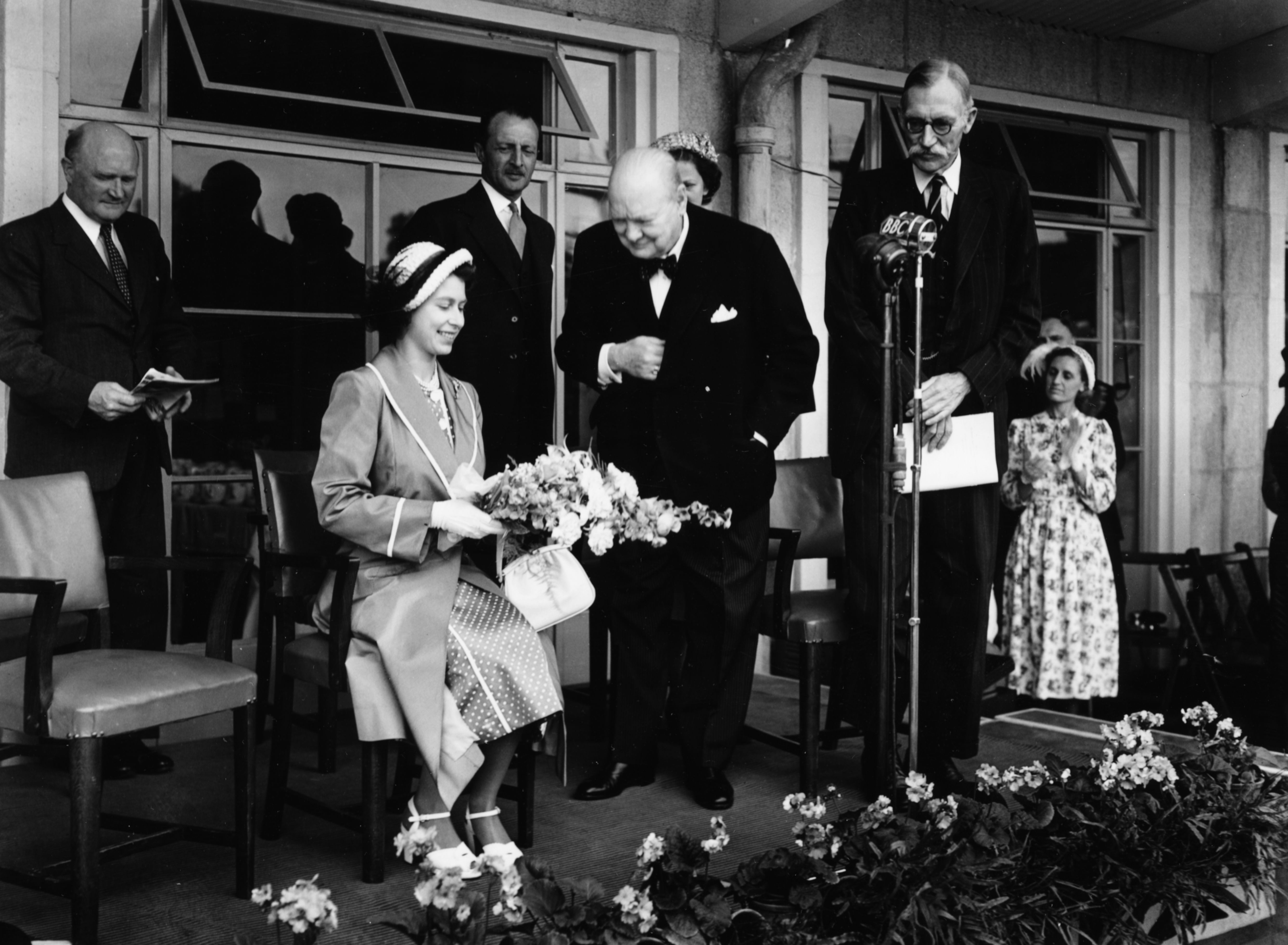 Conservative Party leader Winston Churchill speaking to Princess Elizabeth at the opening of the International Youth Centre, Chigwell, London, July 12th 1951. (Photo by Central Press/Hulton Archive/Getty Images)